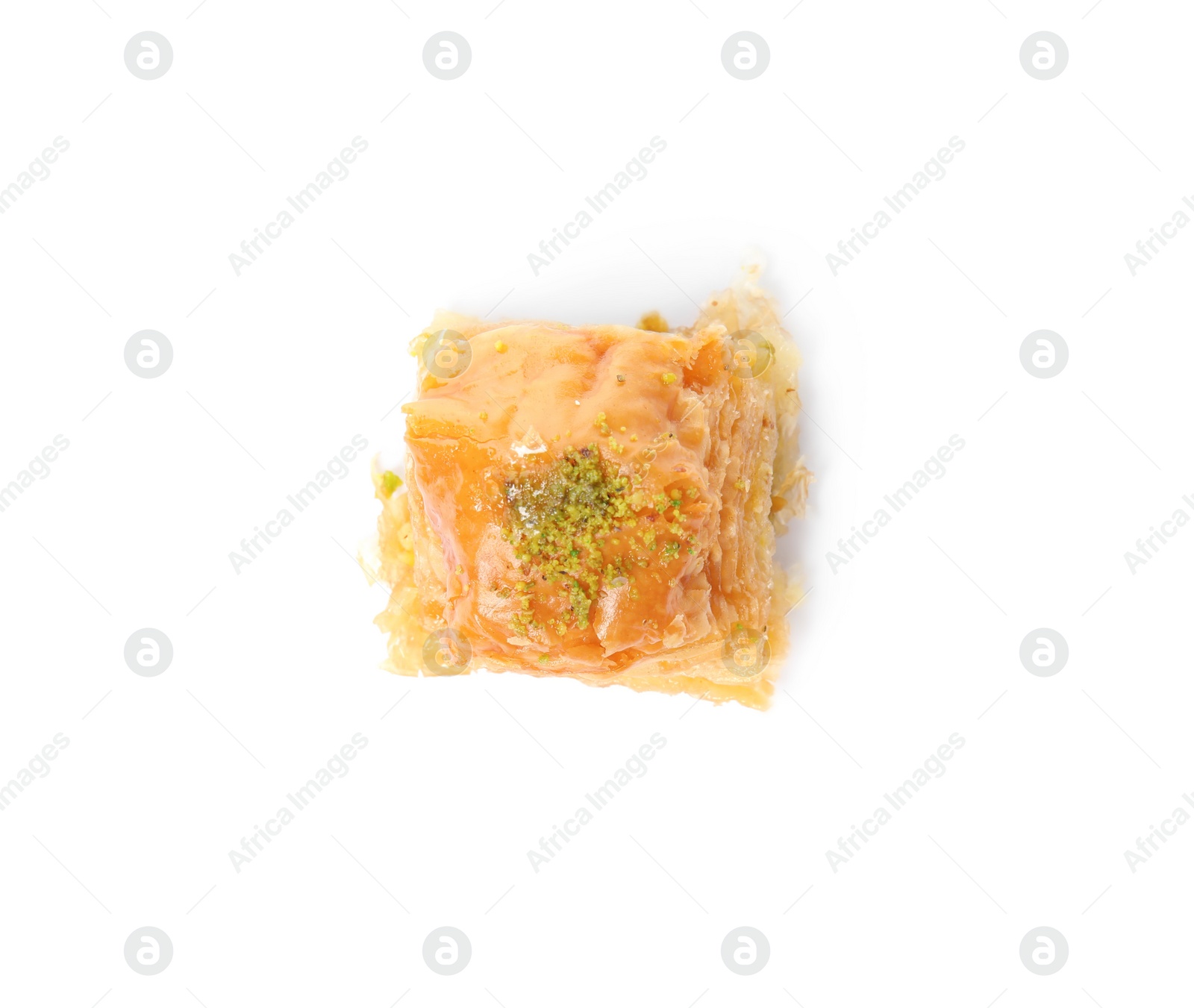 Photo of Delicious baklava with pistachio nuts isolated on white, top view