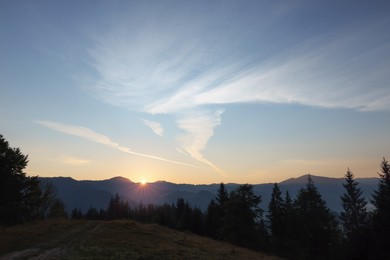 Photo of Picturesque view of mountain landscape and beautiful sunrise sky