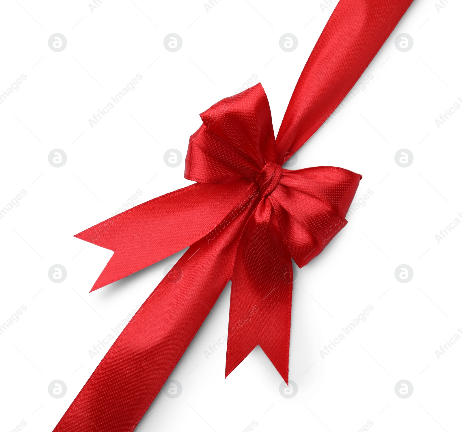 Photo of Red satin ribbon with bow isolated on white, top view