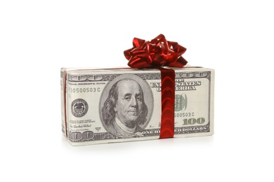Gift box wrapped in decorative paper with dollar pattern on white background