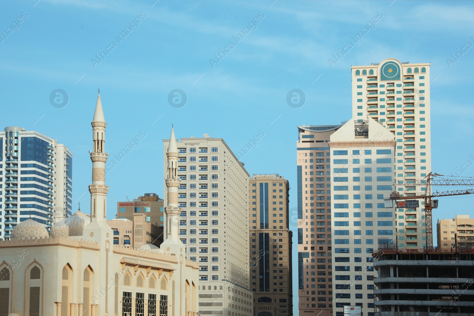 Photo of DUBAI, UNITED ARAB EMIRATES - NOVEMBER 06, 2018: Cityscape with modern buildings and mosque