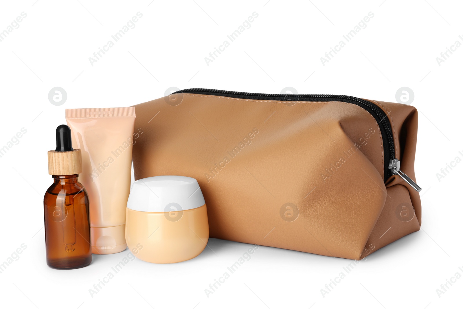 Photo of Preparation for spa. Compact toiletry bag and different cosmetic products isolated on white