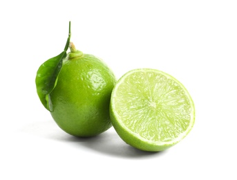 Photo of Fresh ripe green limes on white background