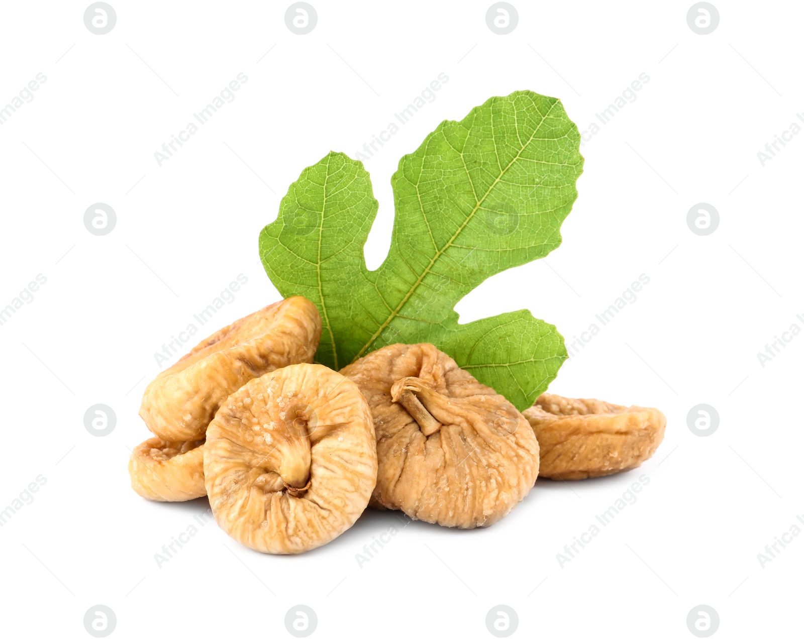 Photo of Tasty dried figs and green leaf isolated on white