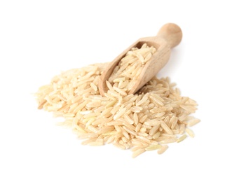 Photo of Scoop and uncooked brown rice on white background