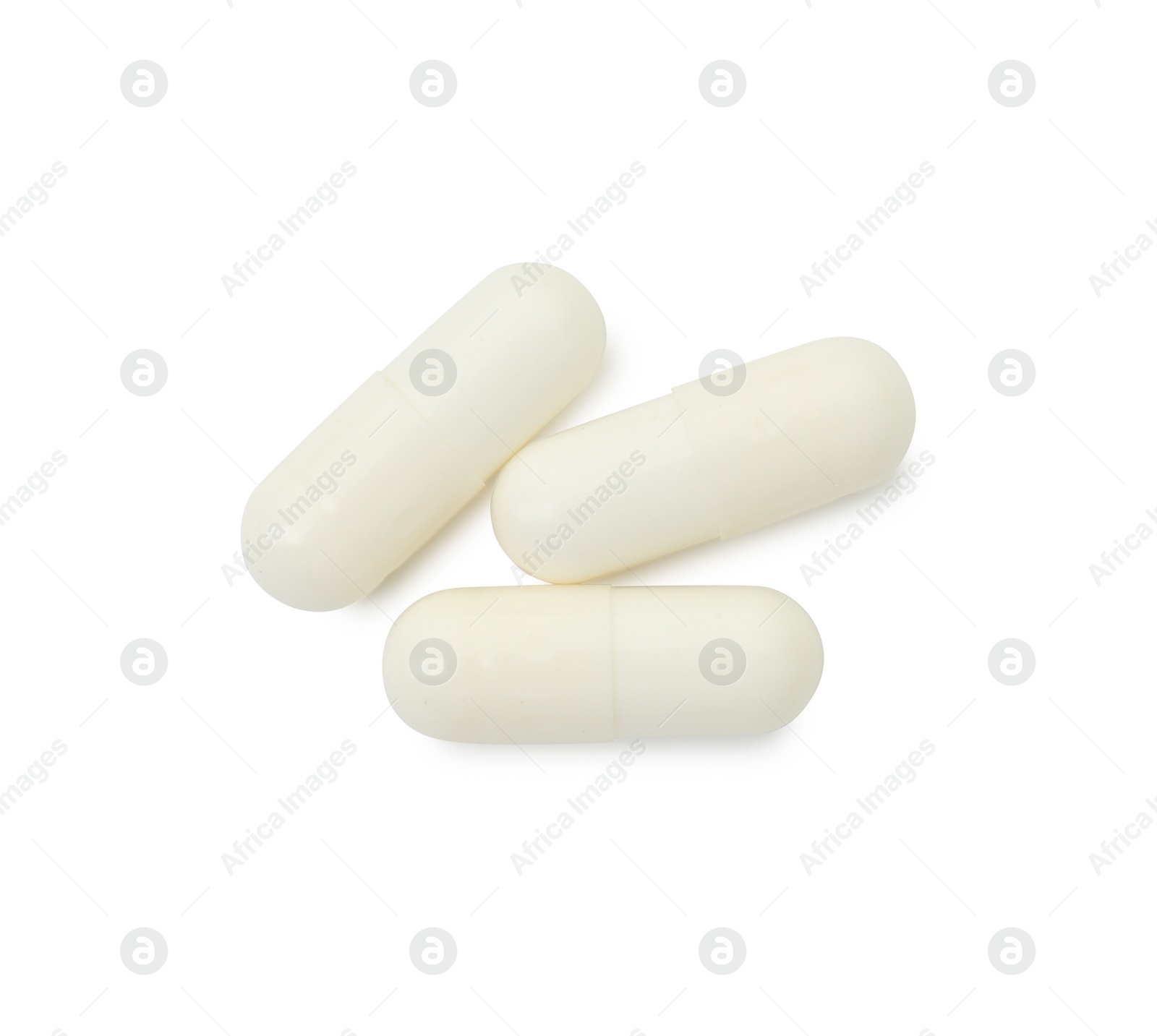 Photo of Vitamin capsules isolated on white, top view. Health supplement