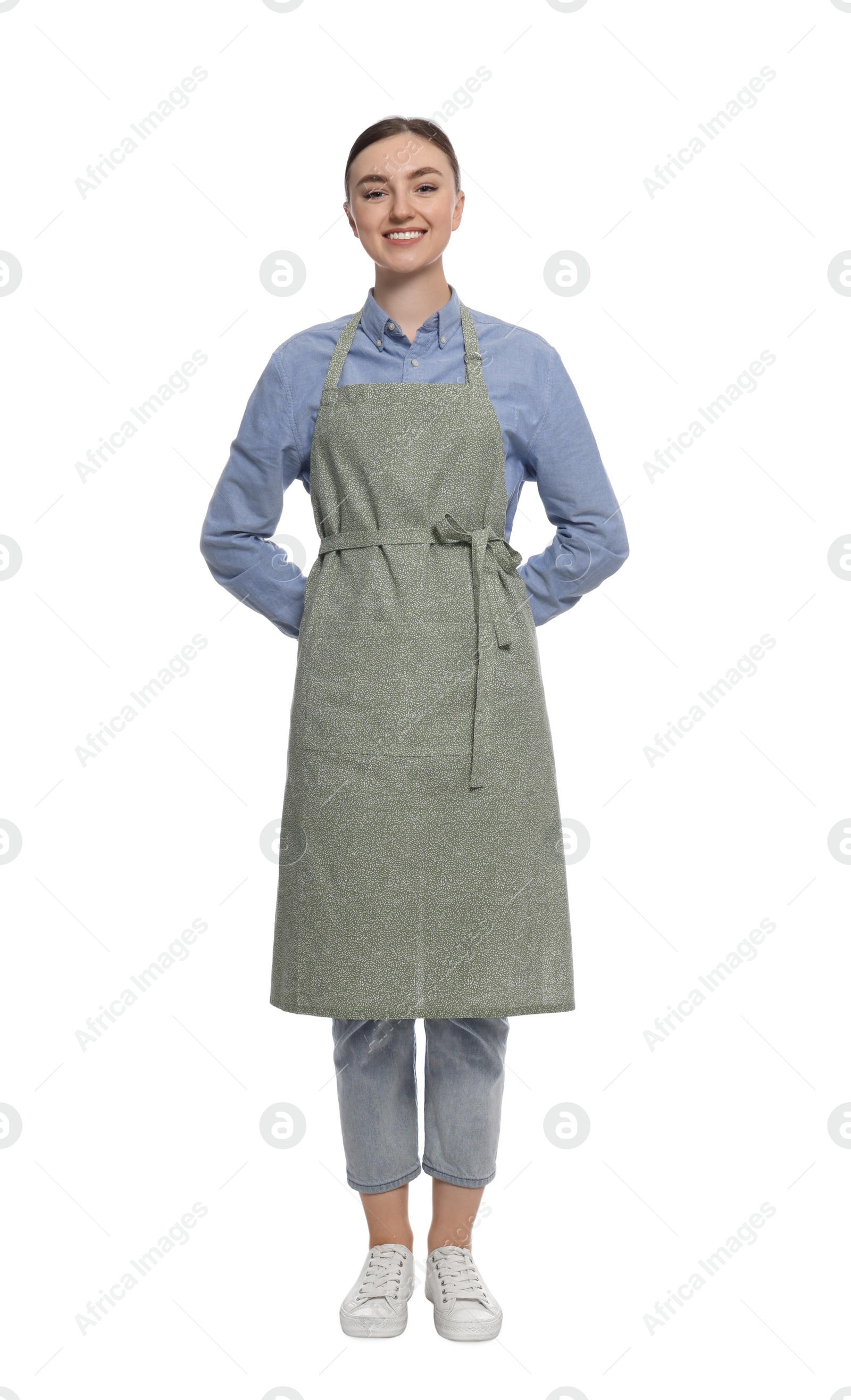 Photo of Beautiful young woman in clean apron on white background