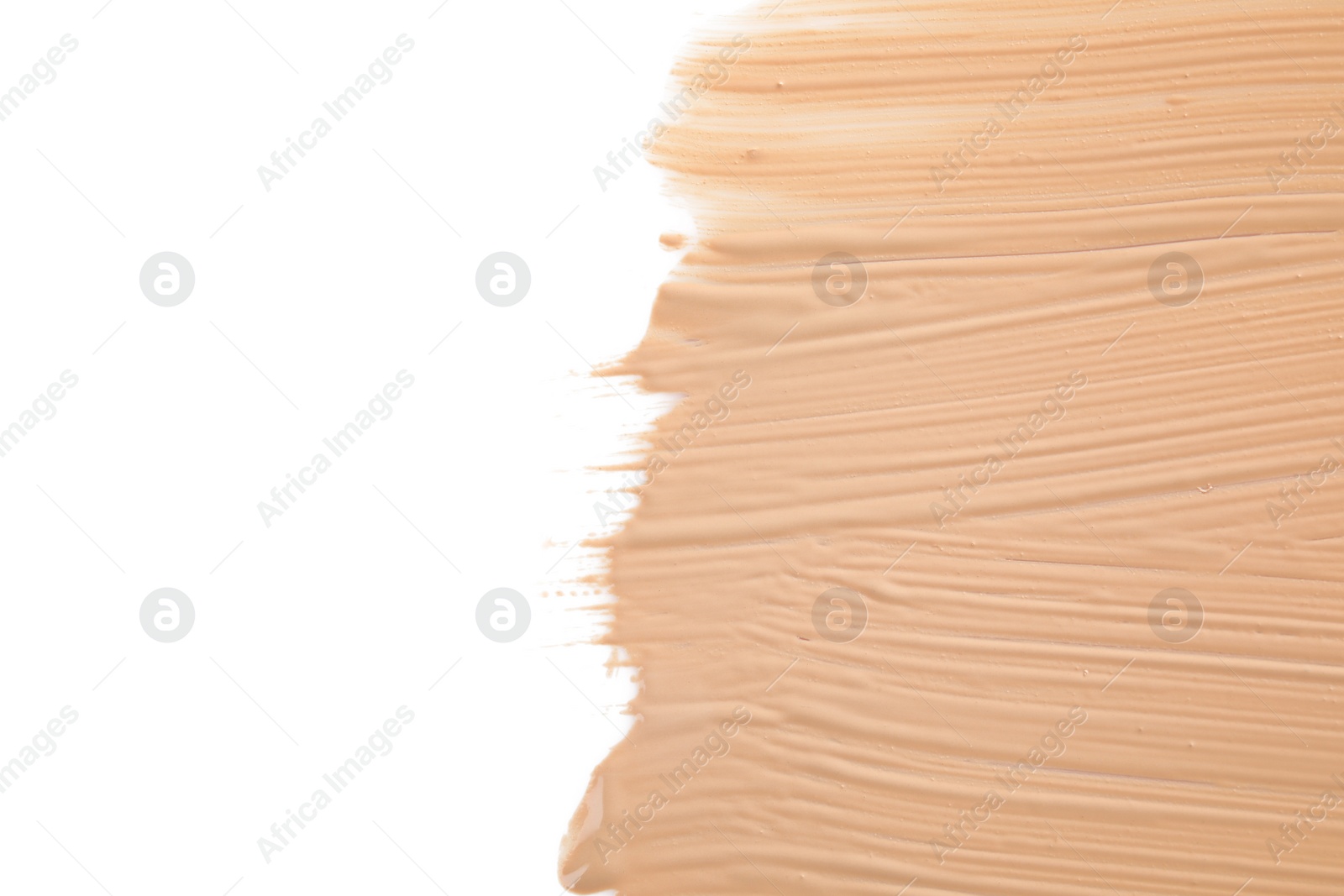 Photo of Liquid foundation on white background, top view. Makeup product