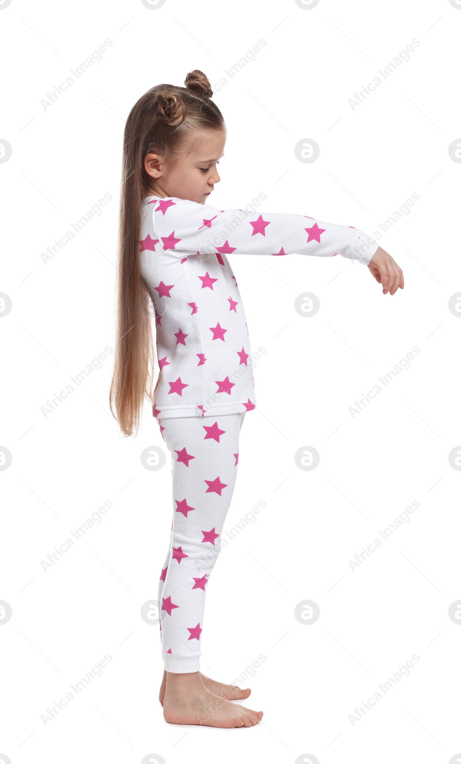 Photo of Girl in pajamas sleepwalking on white background