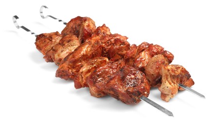 Photo of Metal skewers with delicious shish kebabs isolated on white