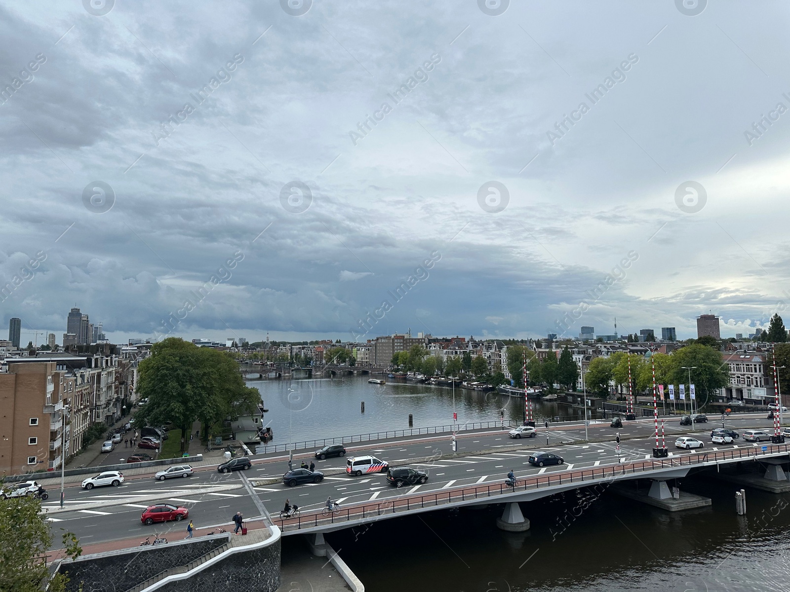 Photo of Amterdam, Netherlands - September 22, 2023: Beautiful view on city under cloudy sky