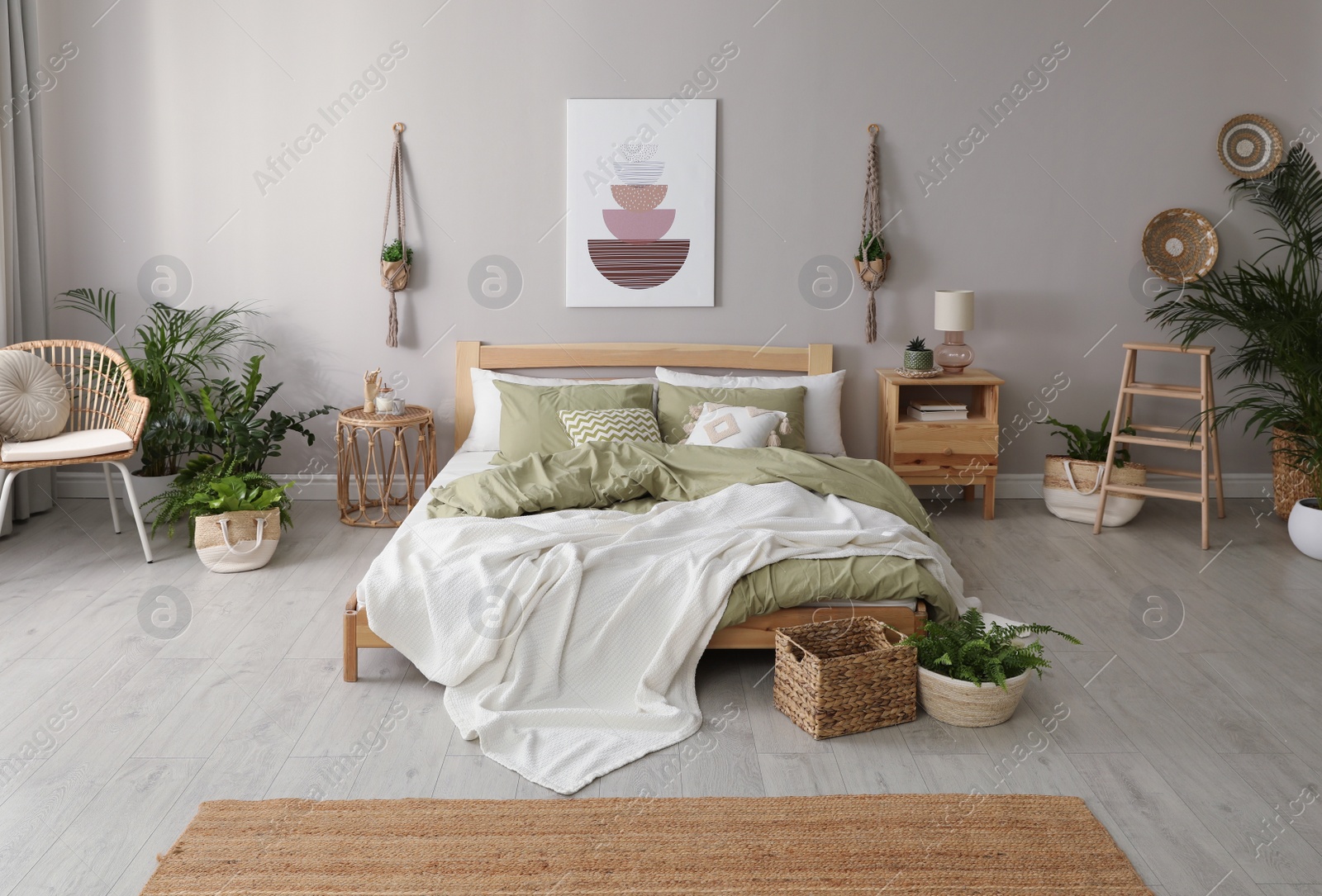 Photo of Stylish room interior with comfortable wooden bed