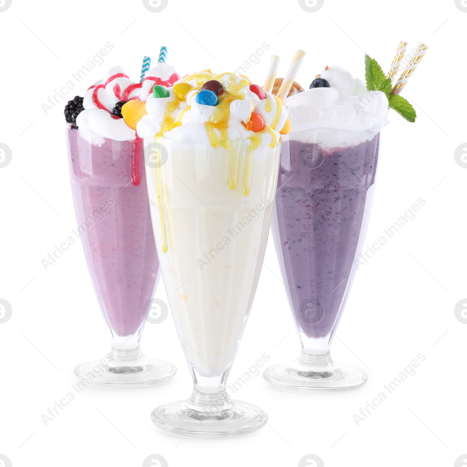 Photo of Different tasty milk shakes in glasses on white background