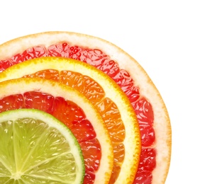 Photo of Slices of fresh citrus fruits on white background, top view