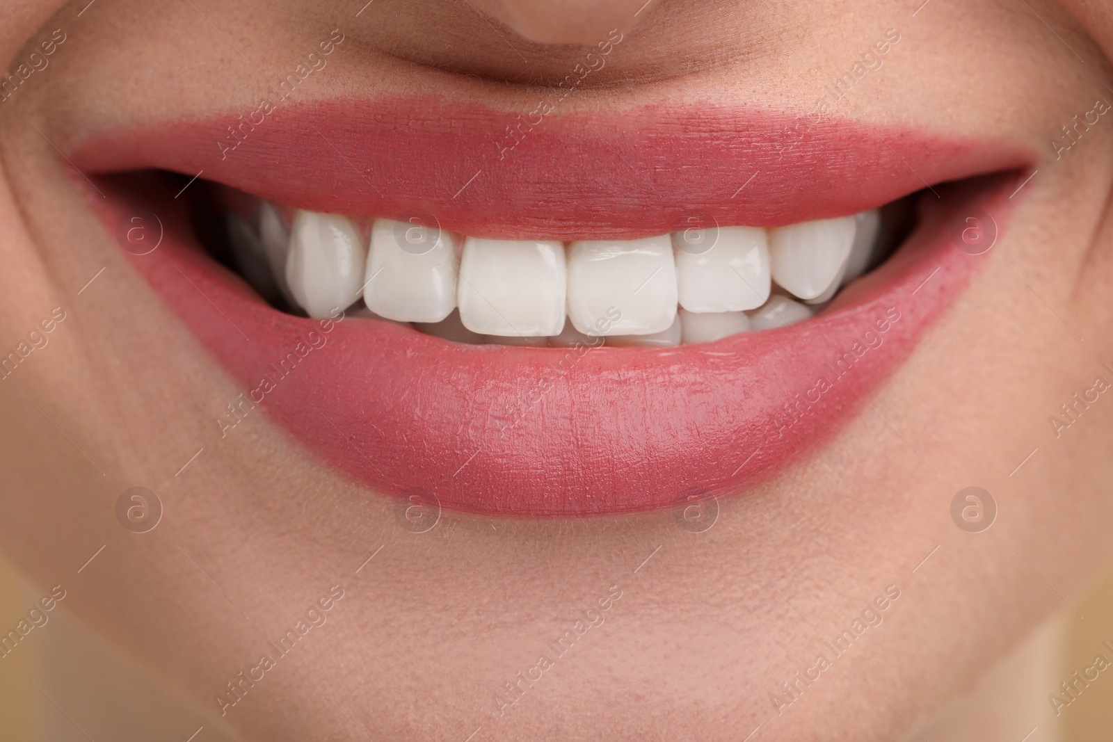 Photo of Young woman with beautiful smile as background, closeup