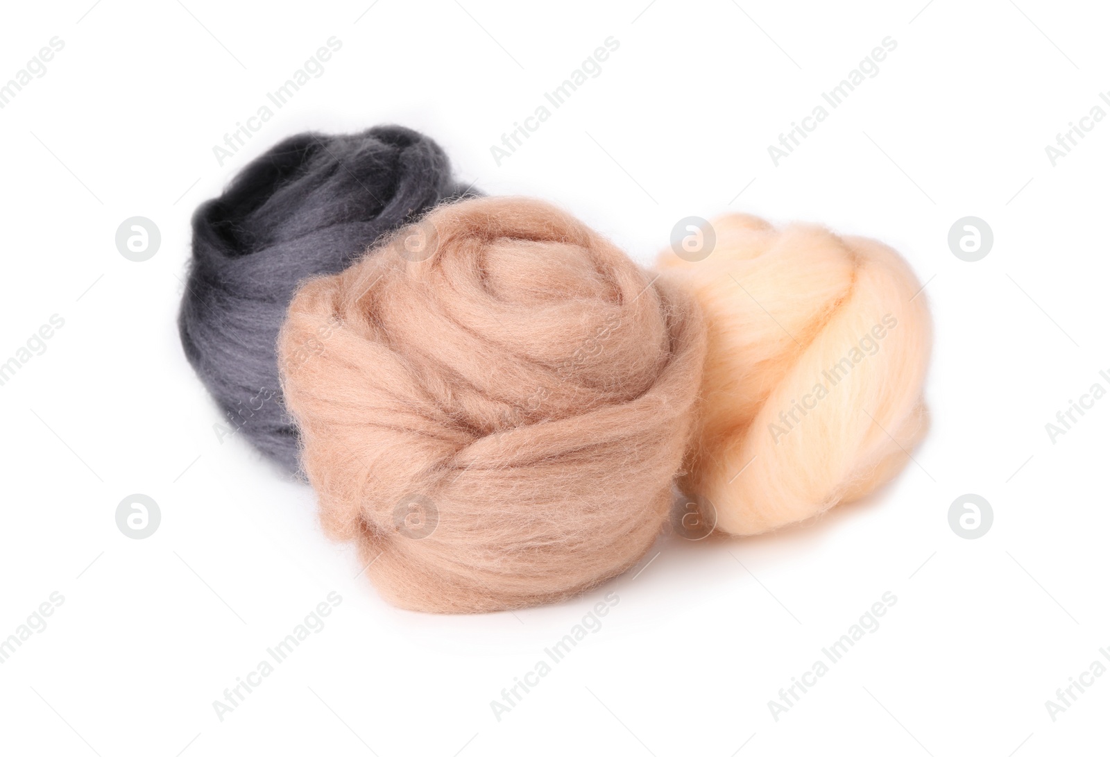 Photo of Beige and grey felting wool isolated on white