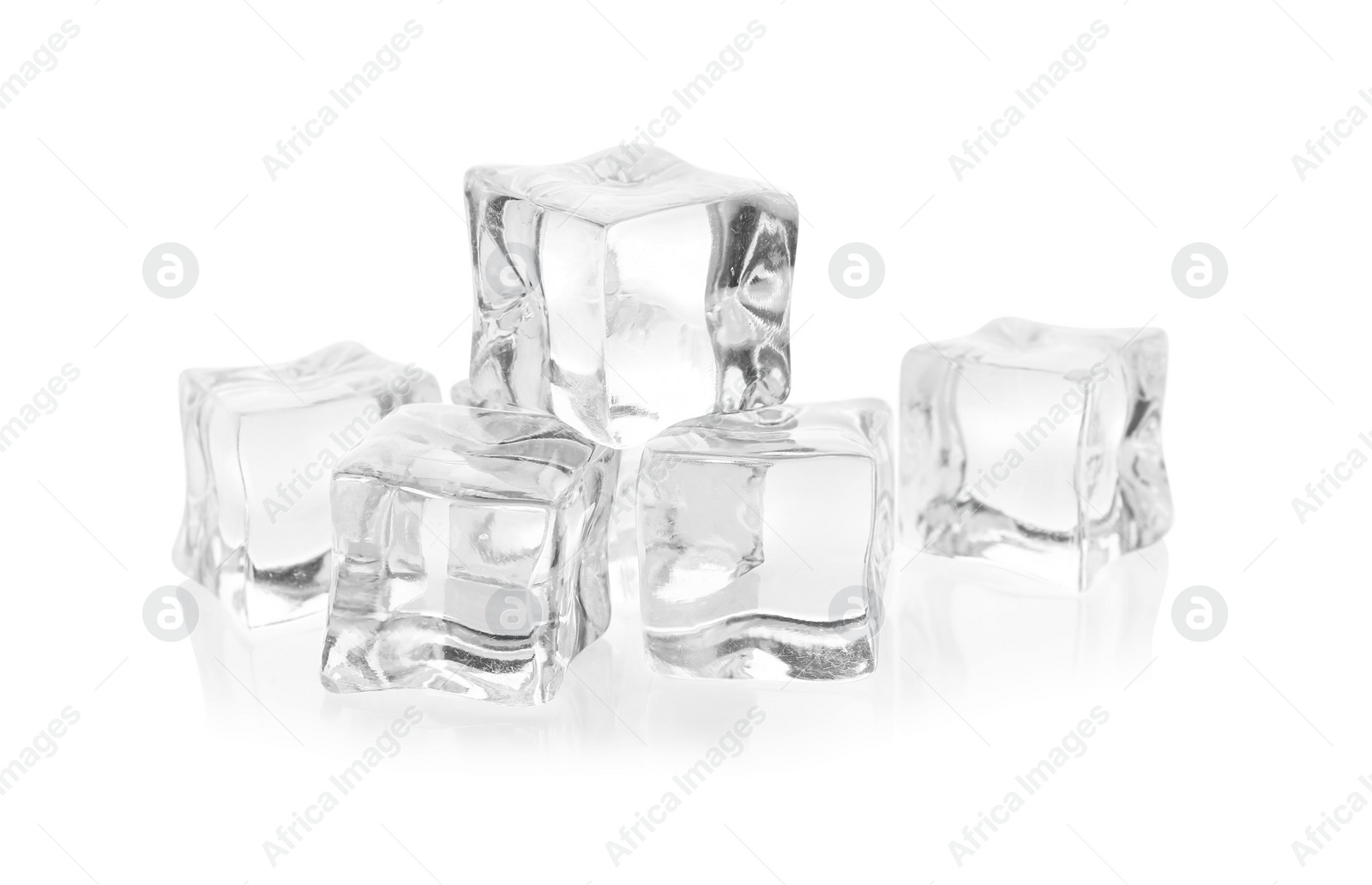 Photo of Many crystal clear ice cubes isolated on white