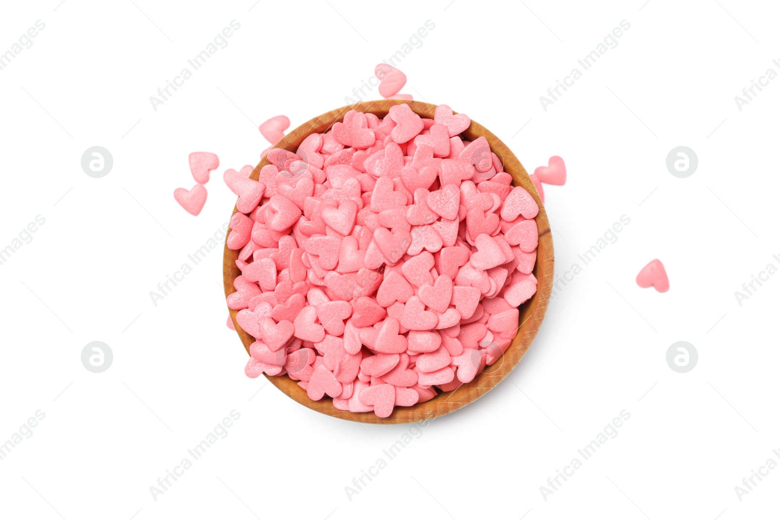 Photo of Sweet candy hearts in bowl on white background, top view