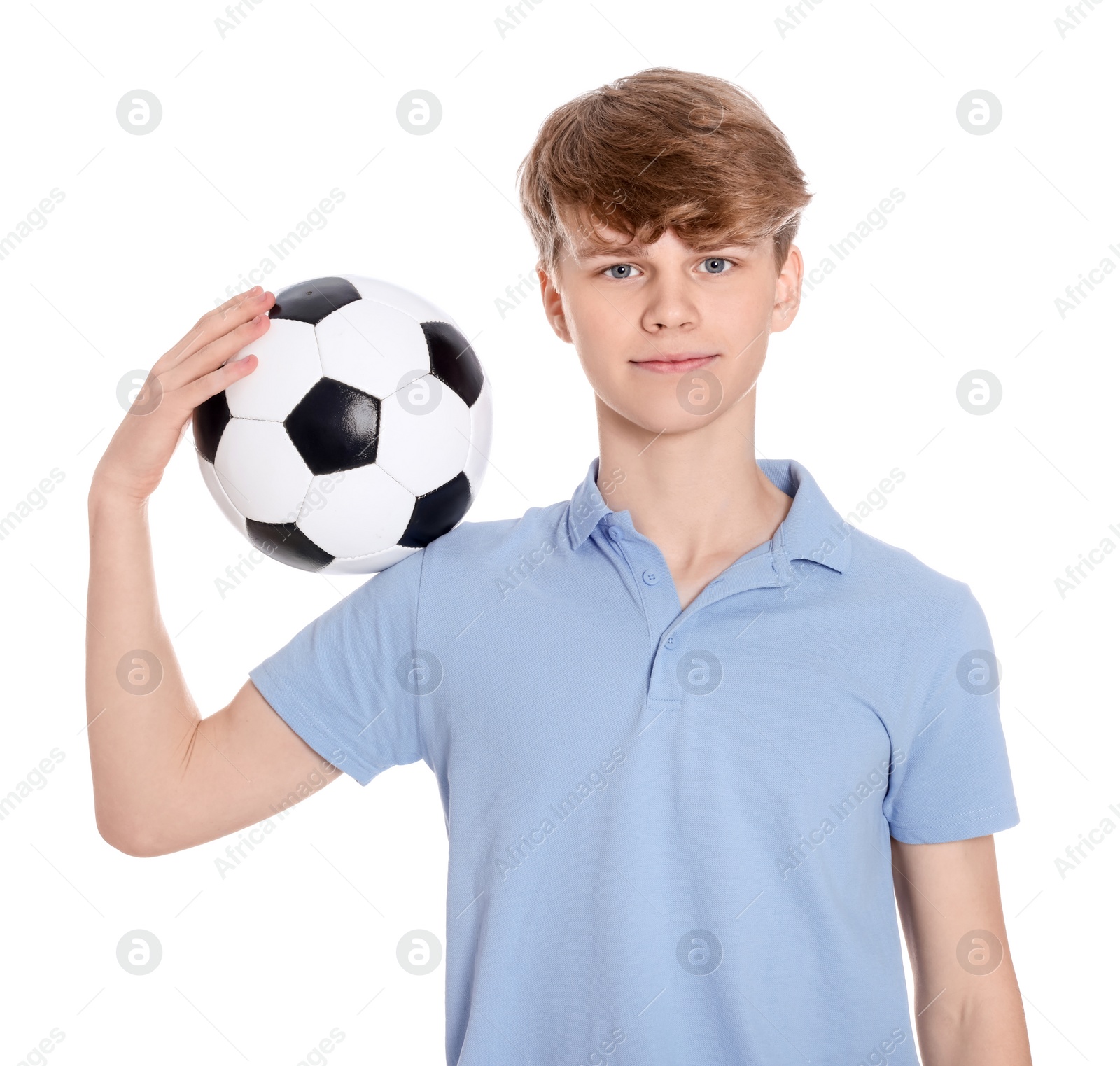 Photo of Teenage boy with soccer ball on white background