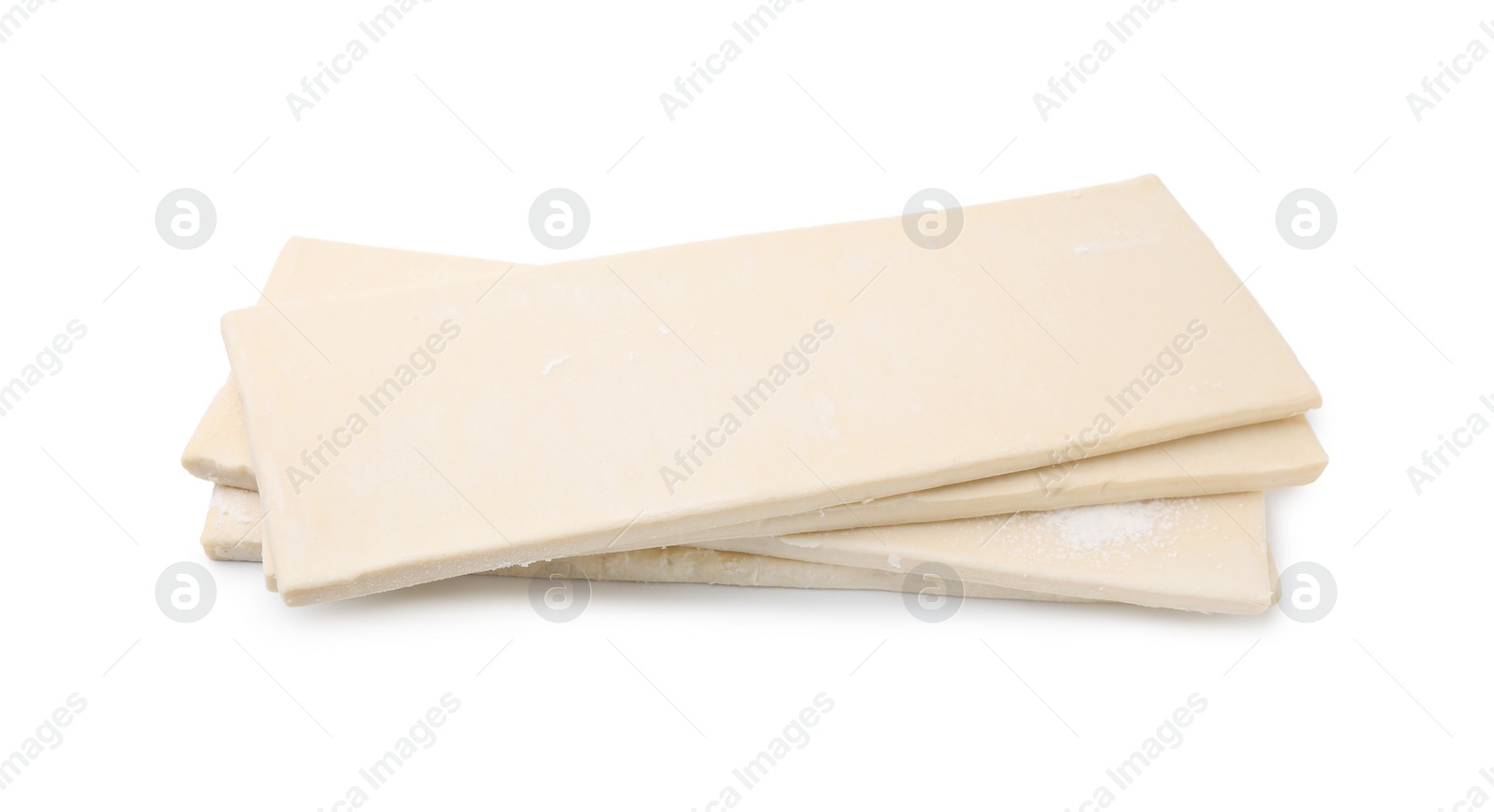 Photo of Raw puff pastry dough isolated on white