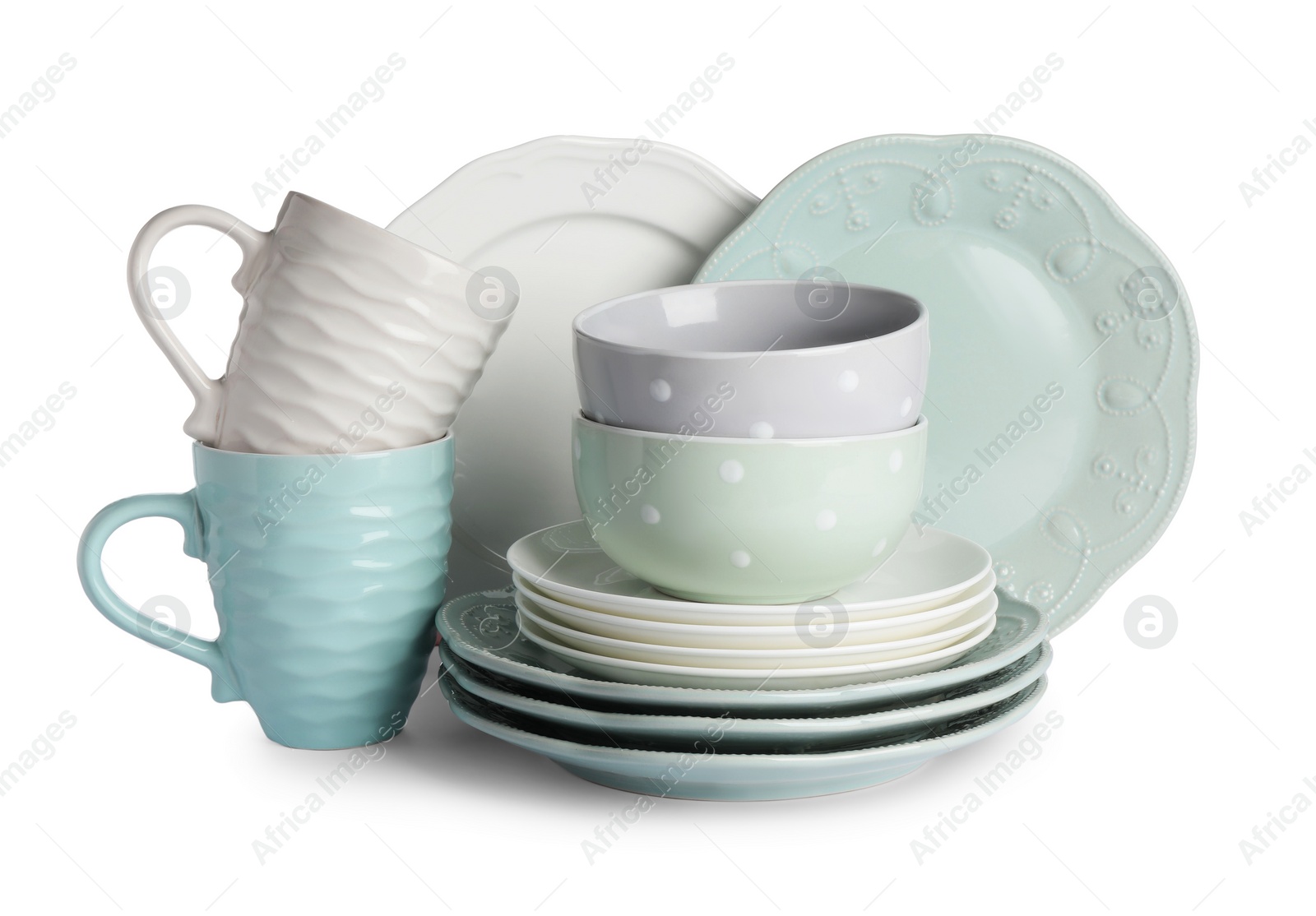 Photo of Set of beautiful ceramic dishware isolated on white