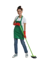 African American woman with green broom on white background