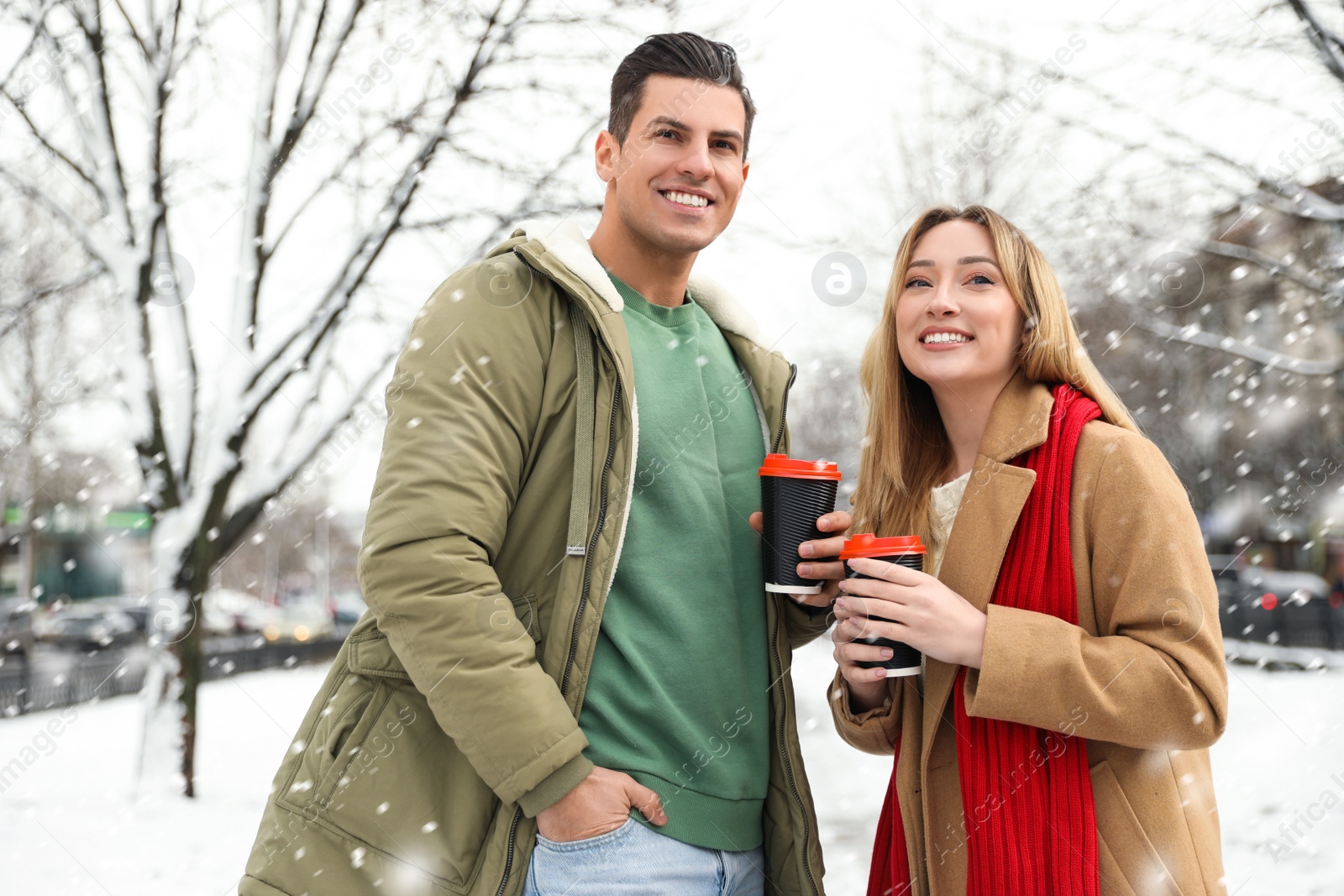 Photo of Beautiful happy couple outdoors on winter day