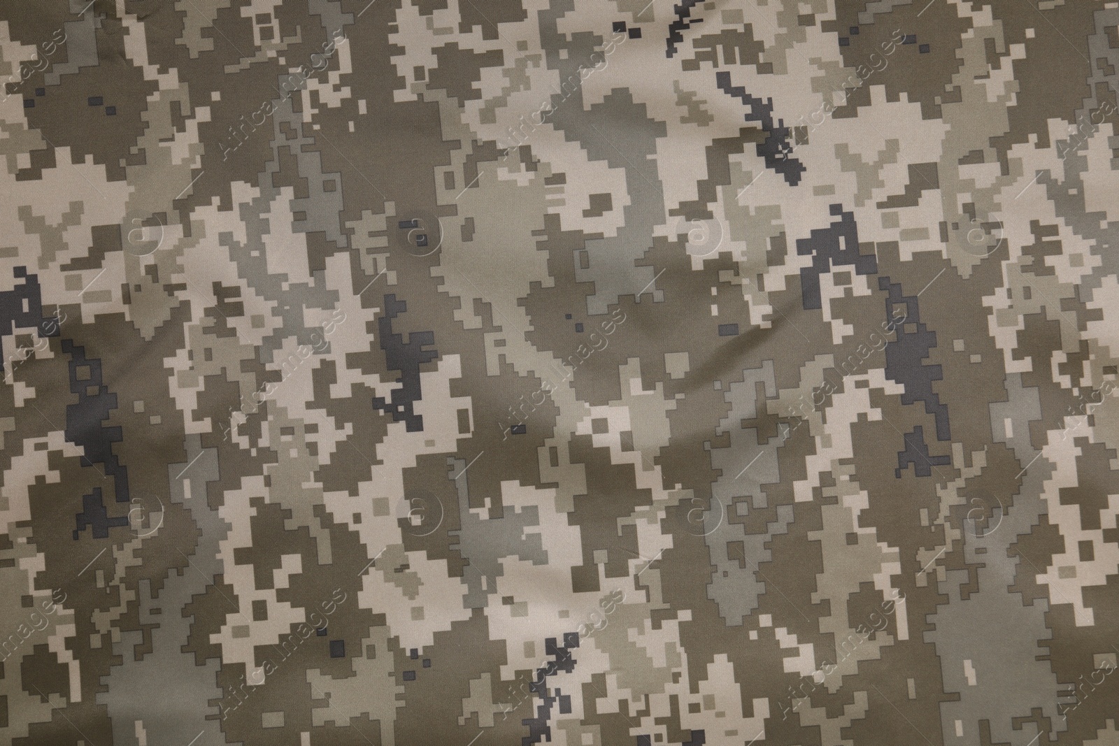 Photo of Texture of camouflage fabric as background, top view