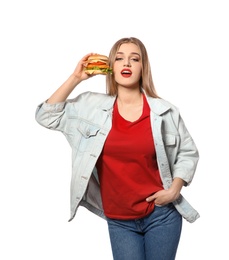 Pretty woman with tasty burger isolated on white