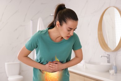 Image of Healthcare service and treatment. Woman suffering from abdominal pain in bathroom. Illustration of gastrointestinal tract