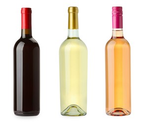 Bottles of white, rose and red wine isolated on white