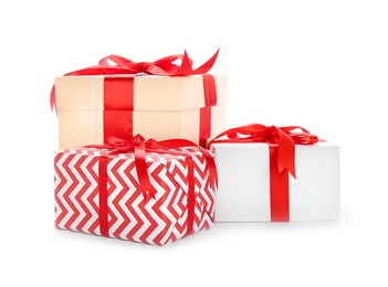 Photo of Different gift boxes with bows on white background