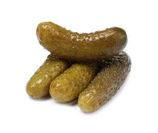 Photo of Pile of tasty pickled cucumbers isolated on white