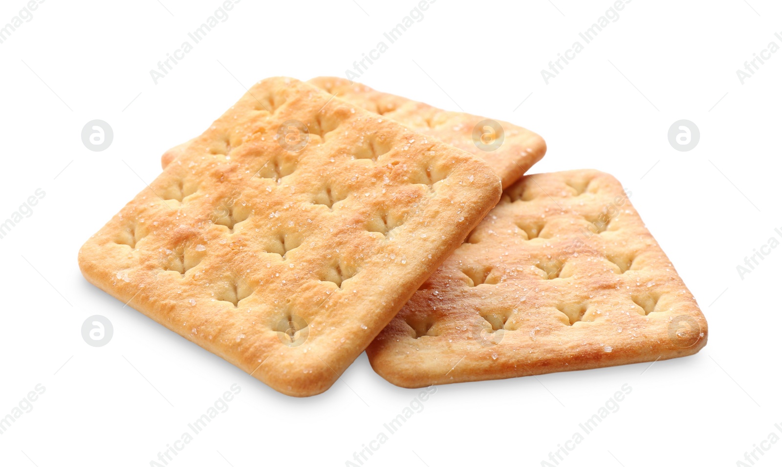 Photo of Crispy crackers isolated on white. Delicious snack