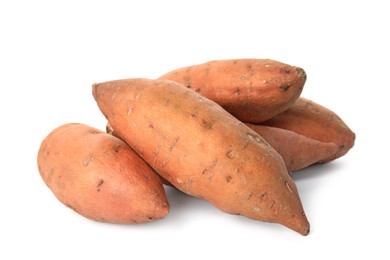 Photo of Heap of whole ripe sweet potatoes on white background