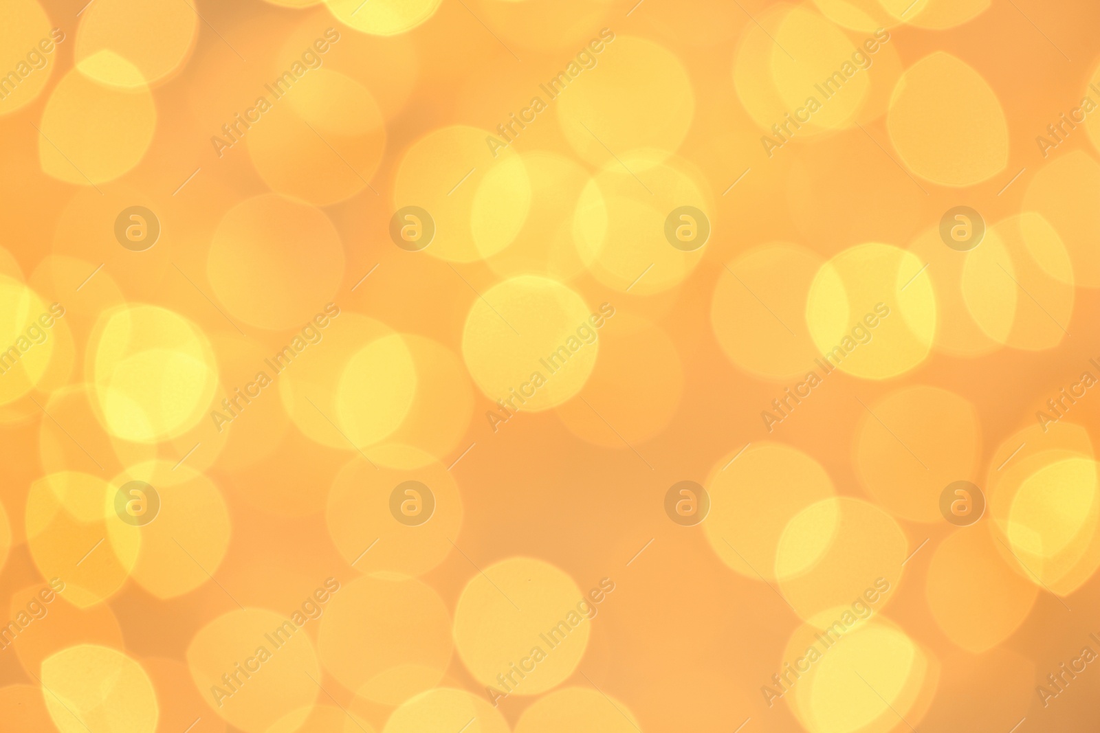 Photo of Beautiful golden lights as background. Bokeh effect