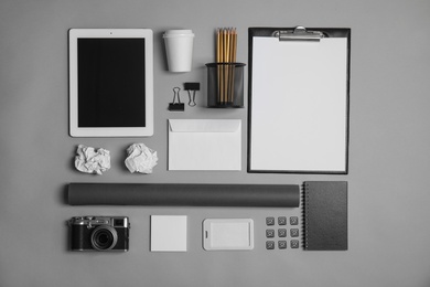 Photo of Flat lay composition with stationery on grey background. Mock up for design