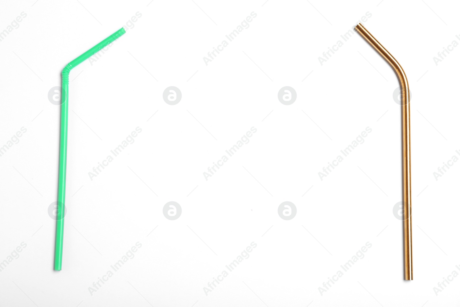 Photo of Plastic and metal drinking straws on white background, top view. Recycling concept