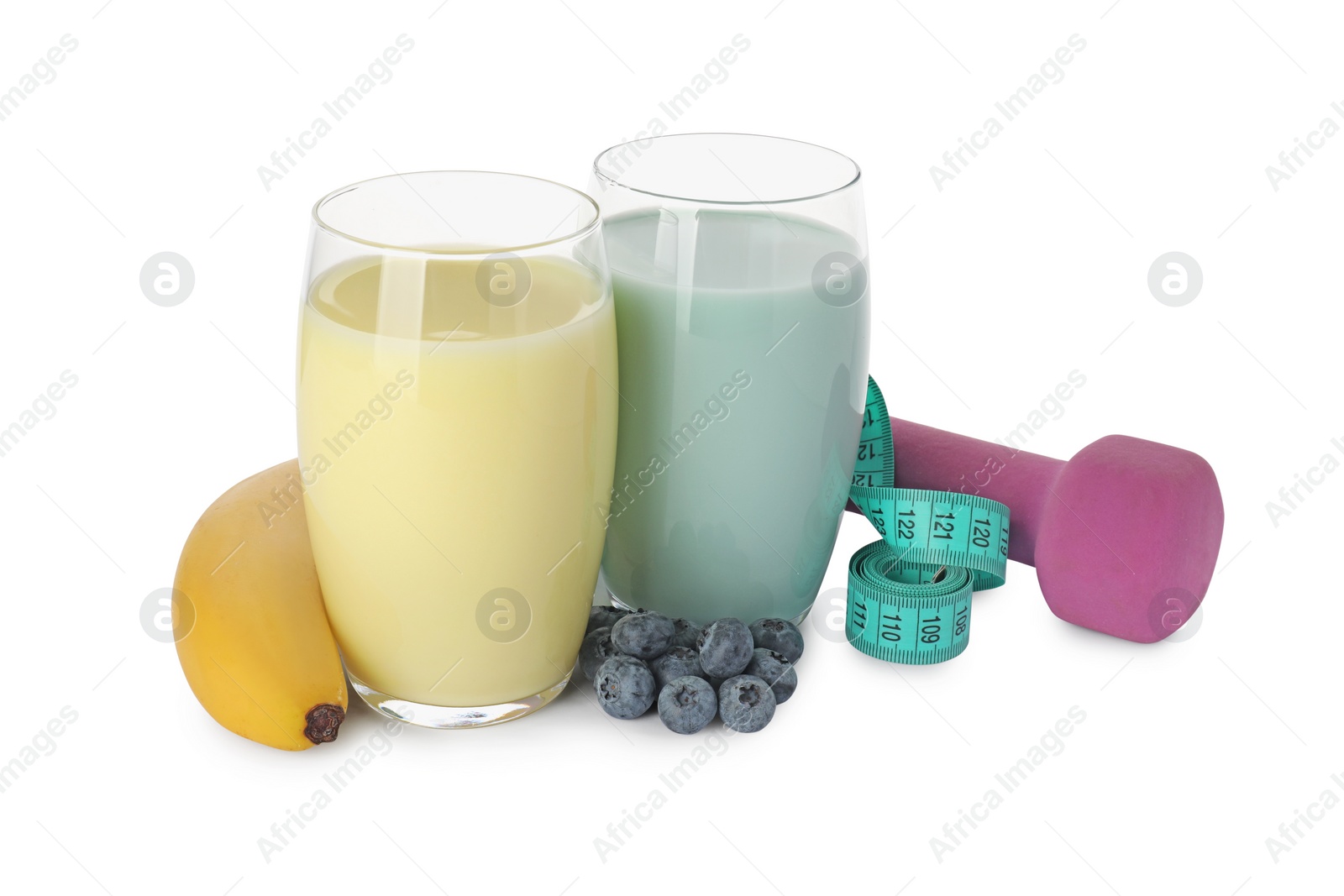 Photo of Tasty shakes, banana, blueberries, dumbbell and measuring tape isolated on white. Weight loss