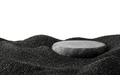 Photo of Presentation of product. Stone podium on black sand against white background