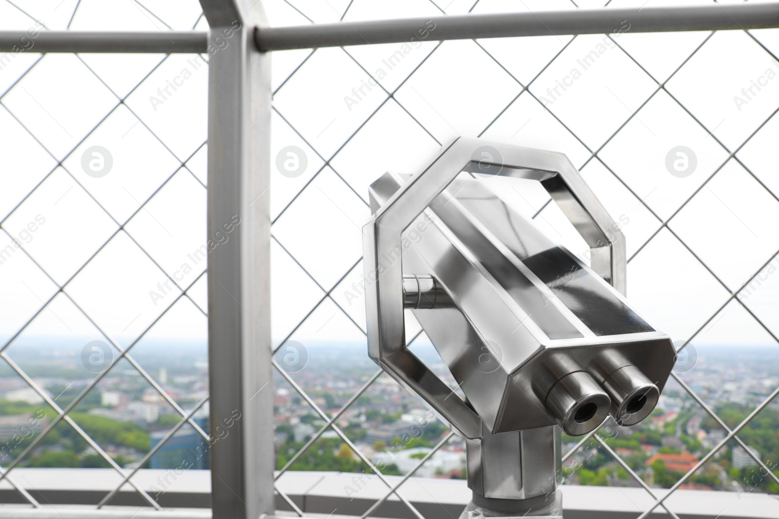 Photo of Metal tower viewer on observation deck, closeup. Space for text