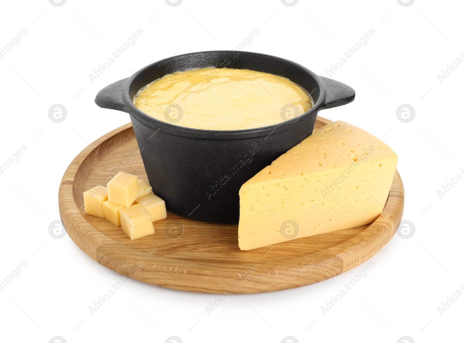 Photo of Fondue with tasty melted cheese and pieces isolated on white