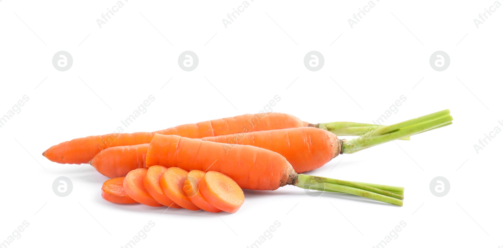 Fresh ripe juicy carrots isolated on white Photo of Fresh ripe juicy carrots isolated on white