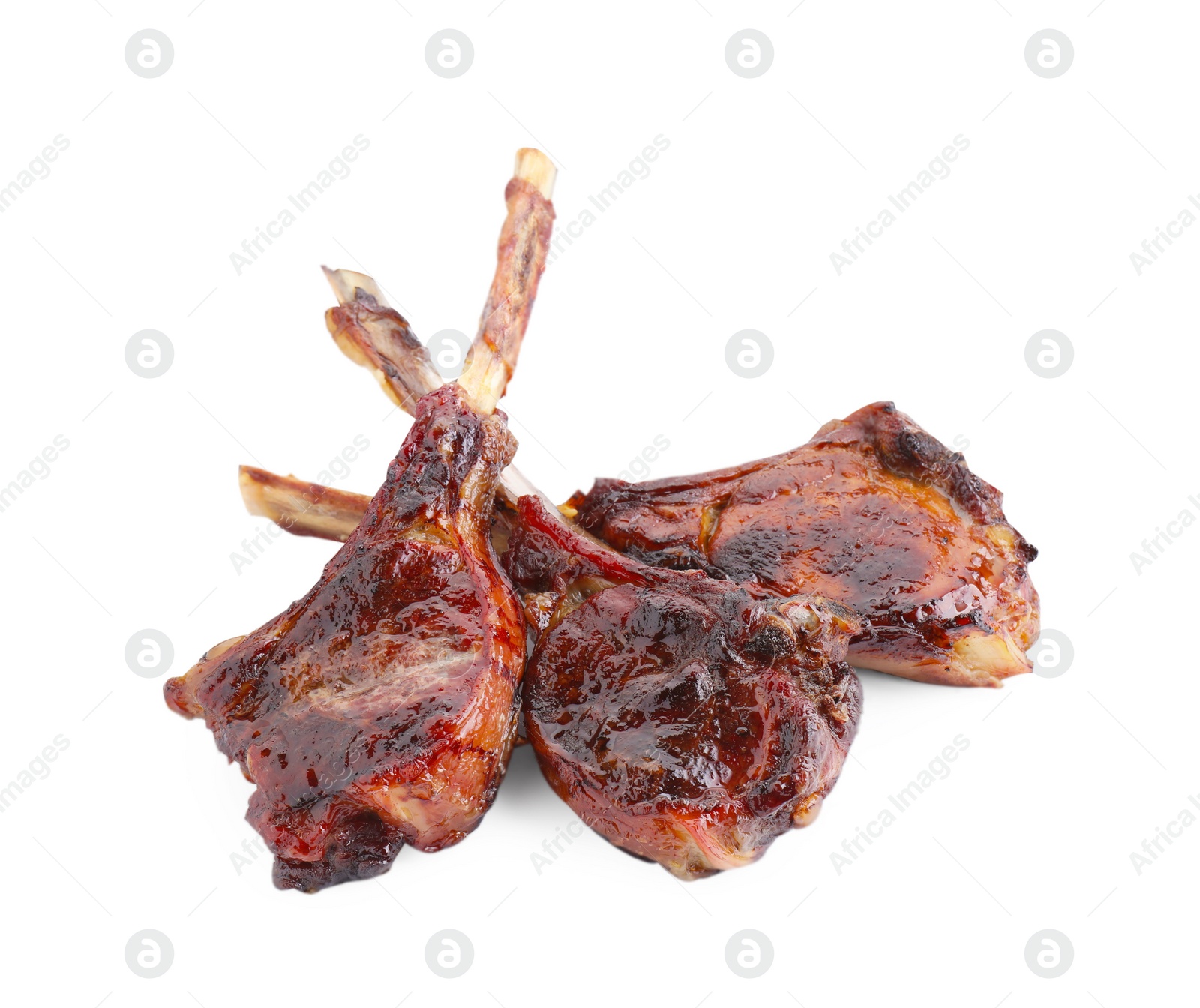 Photo of Pieces of delicious grilled beef meat isolated on white