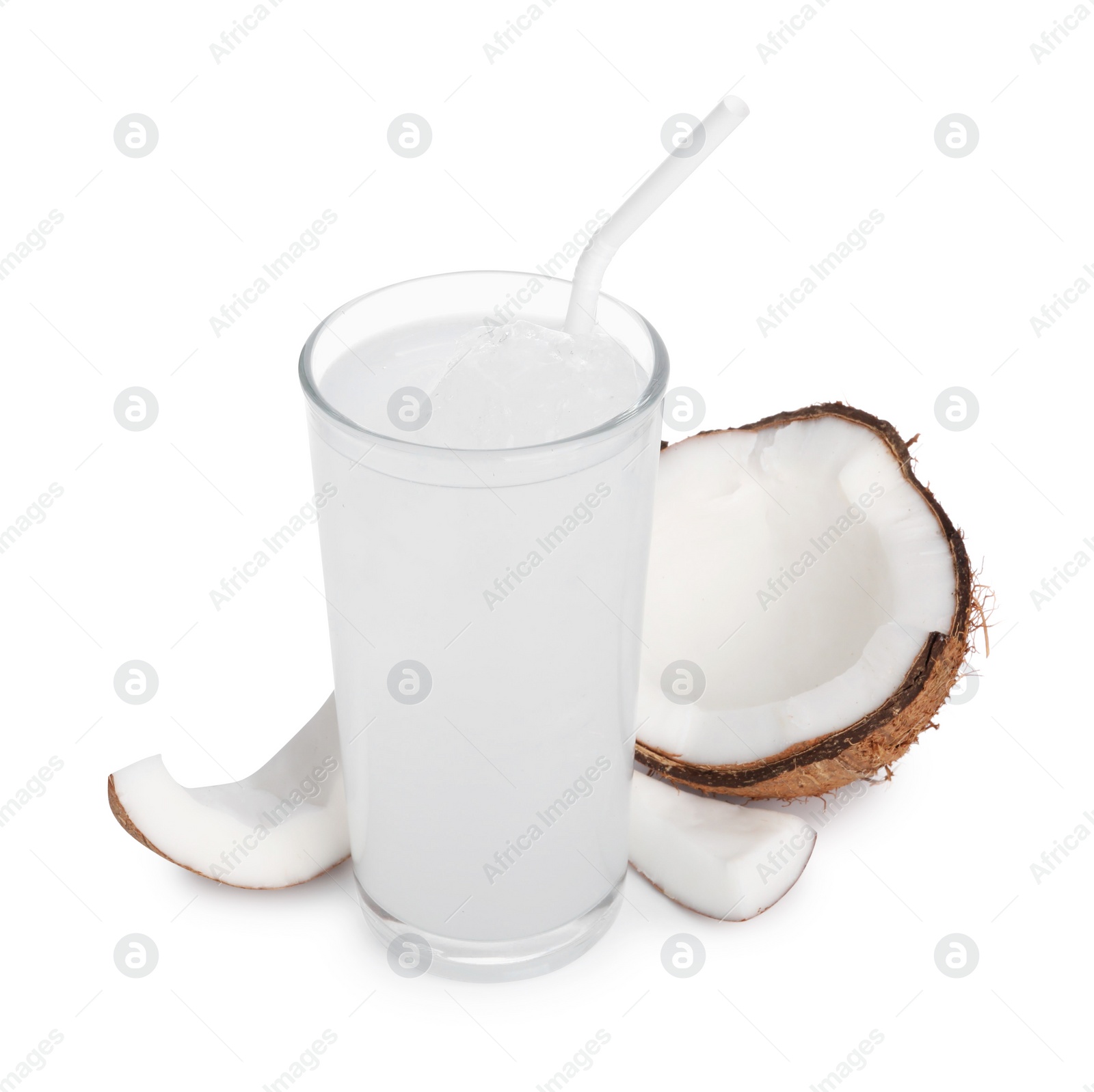 Photo of Glass of coconut water, ice cubes and nut isolated on white