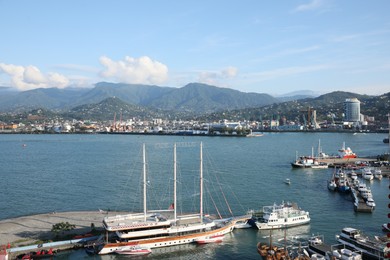 Batumi, Georgia - October 12, 2022: Picturesque view of sea port with boats near city