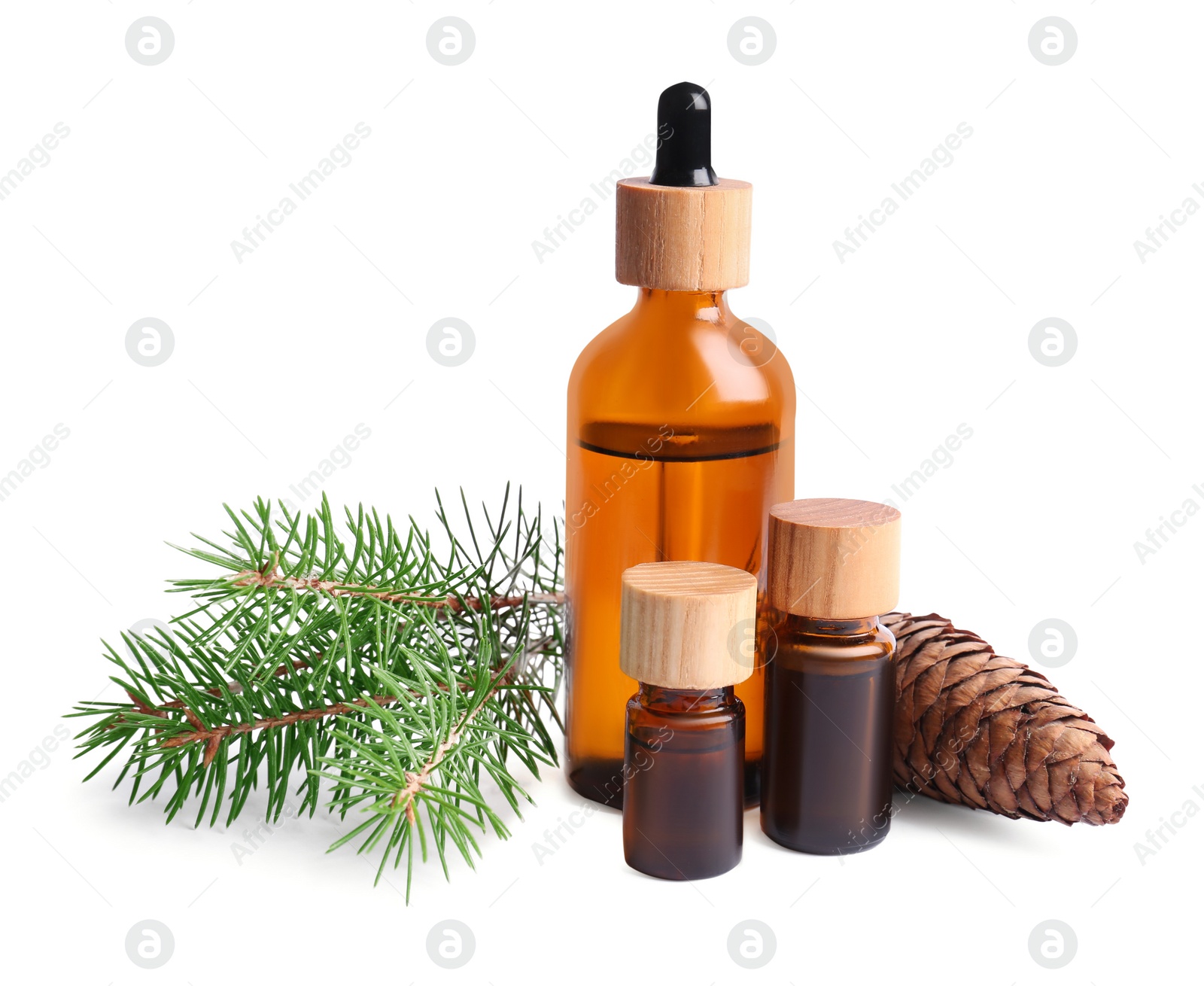 Photo of Bottles of pine essential oil on white background