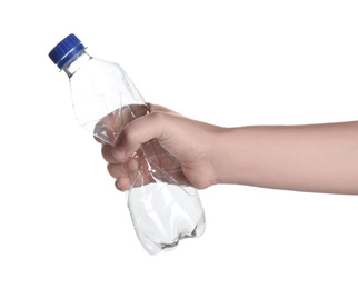 Photo of Woman holding crumpled bottle on white background, closeup. Plastic recycling