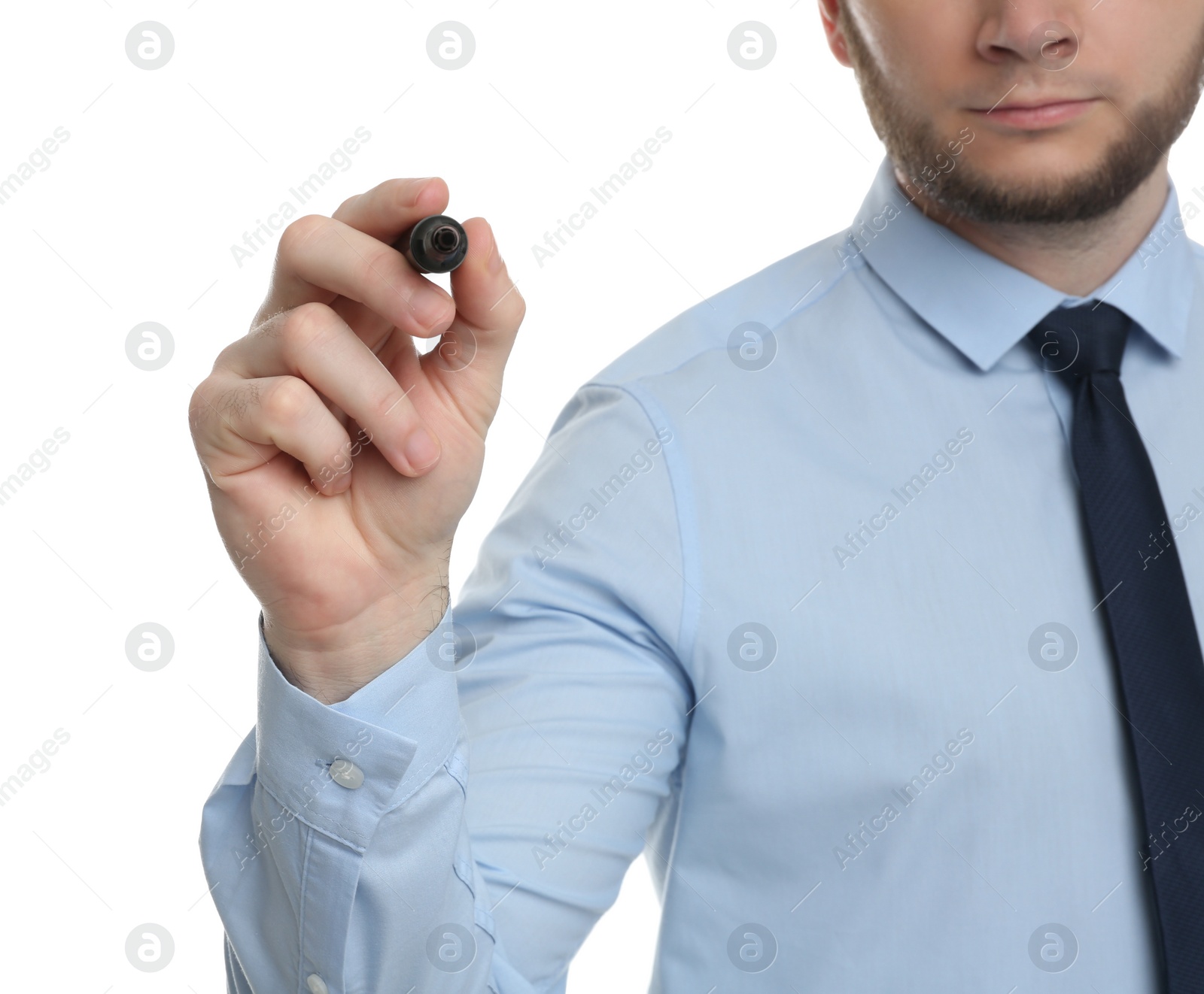 Photo of Businessman with marker against white background, focus on hand