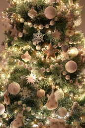 Photo of Beautiful decorated Christmas tree as background, closeup